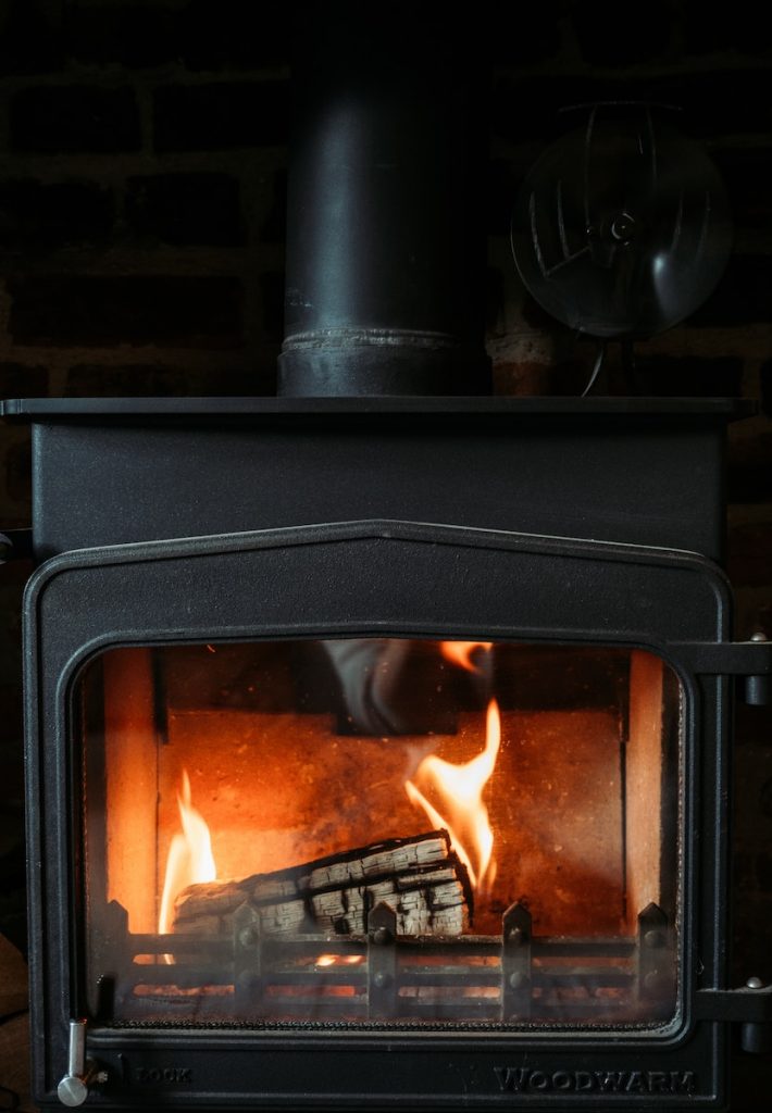 black wood burner with fire