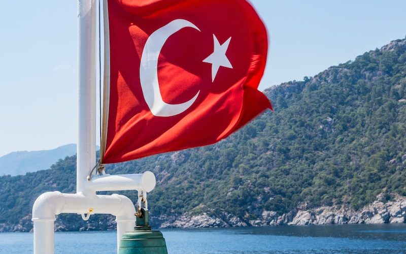 Turkey flag on pole with bell